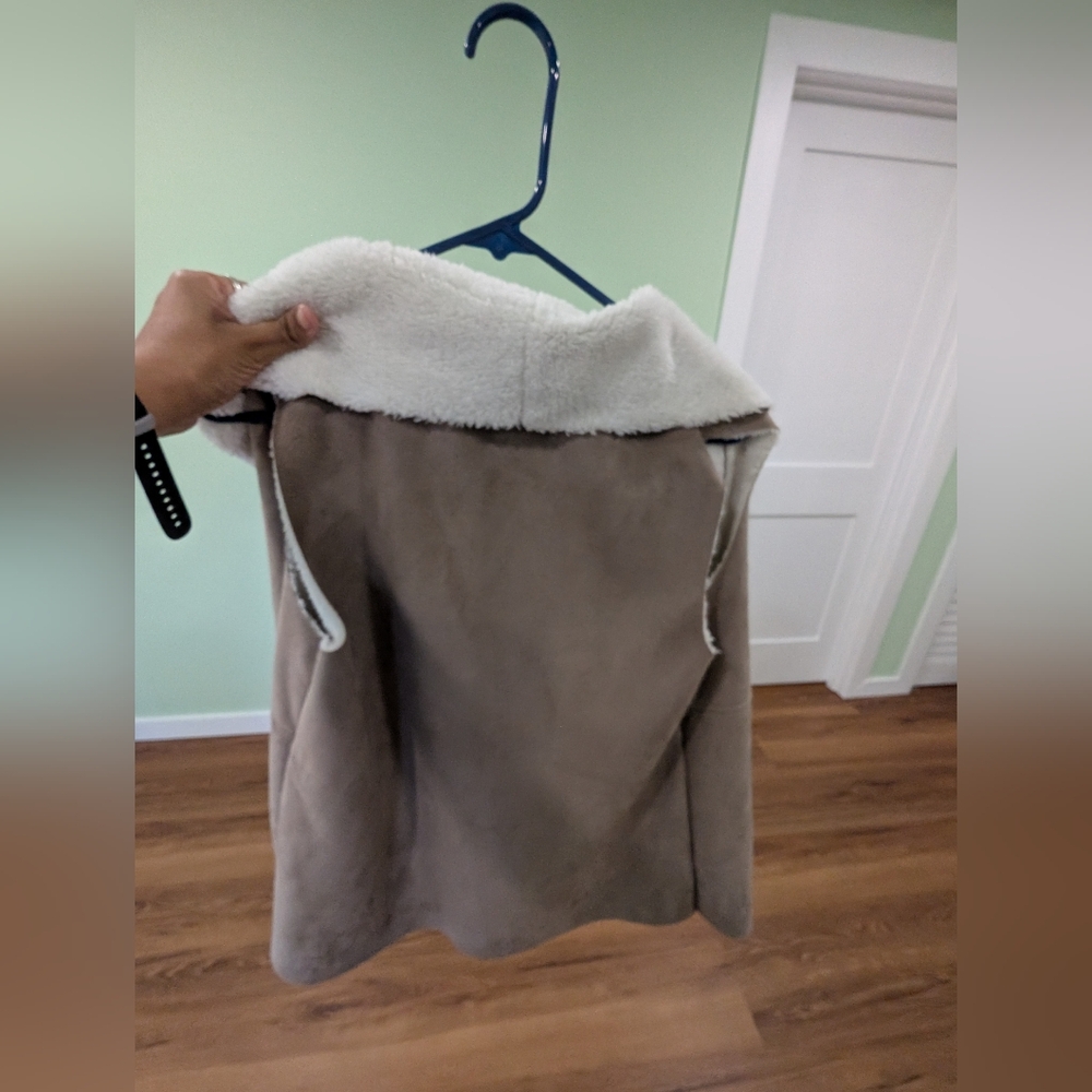 Susina suede vest with faux fur inside.